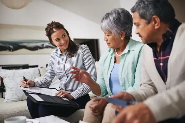 final expense life insurance agent sitting down with a client.